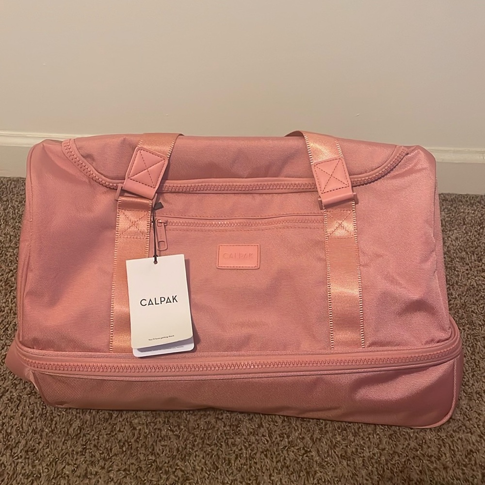 NWT Calpak pink duffel bag